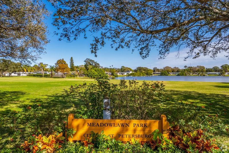 Meadowlawn Park Neighborhood Sign in Grassy Field